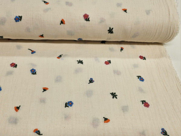 TETRA tkanina, vezena, rišilje, dvoslojna- natur smetana barva tetra s povezenimi  pisanimi rožicami