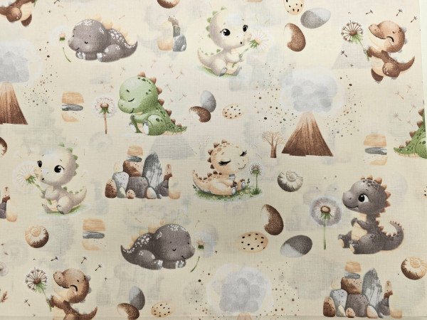 Bombažno platno- dinozavri večji na svetlo bež osnovi,