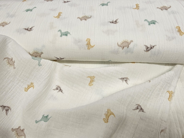 TETRA tkanina, dvoslojna- dinozavri na off white beli osnovi