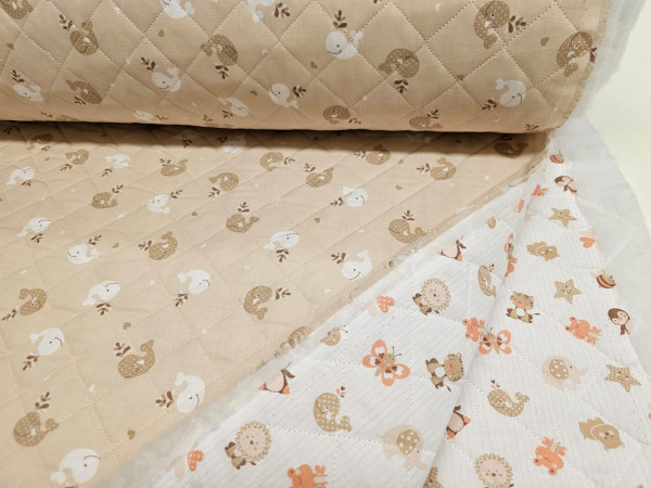 Vatirana bombažna prešita tkanina, obojestranska- svetlo bež osnova z drobnim vzorcem 