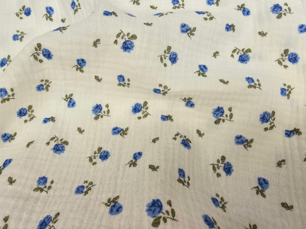 TETRA tkanina, dvoslojna- drobne pariško modre rožice na beli osnovi