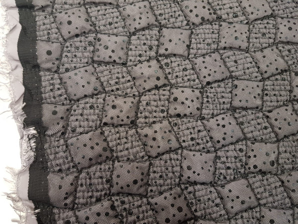 Prešita tkanina-siva