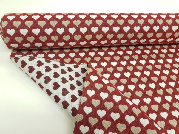 Dekor gobelin-srčki na rdeči osnovi